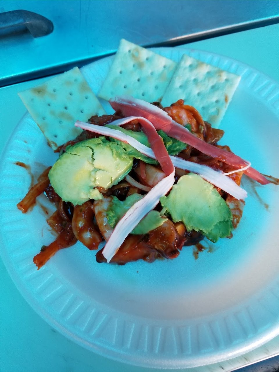 Shrimp tacos and cocktail specials listed.